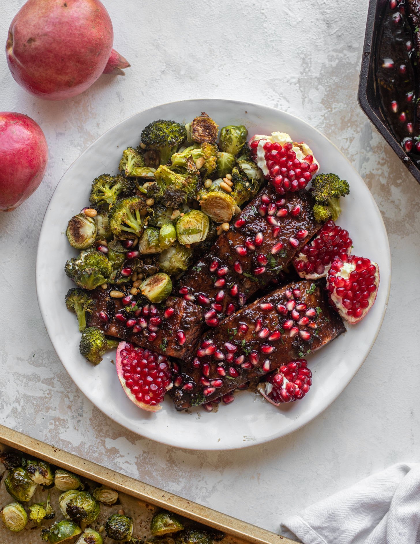 sticky pomegranate salmon with broccoli & brussels
