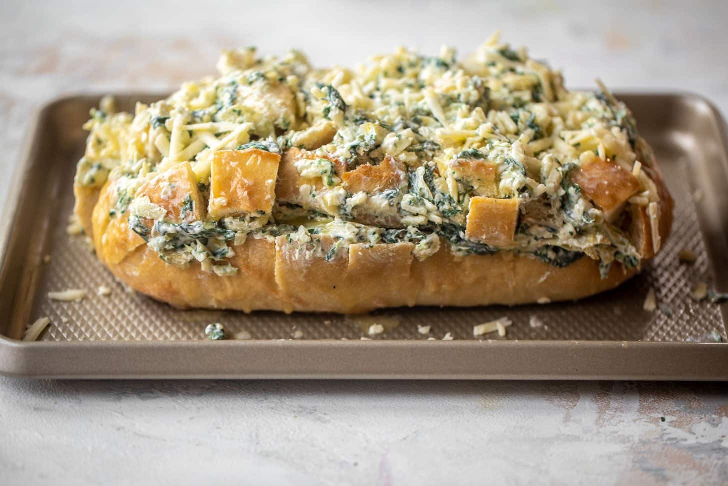 spinach artichoke pull apart bread ready for the oven