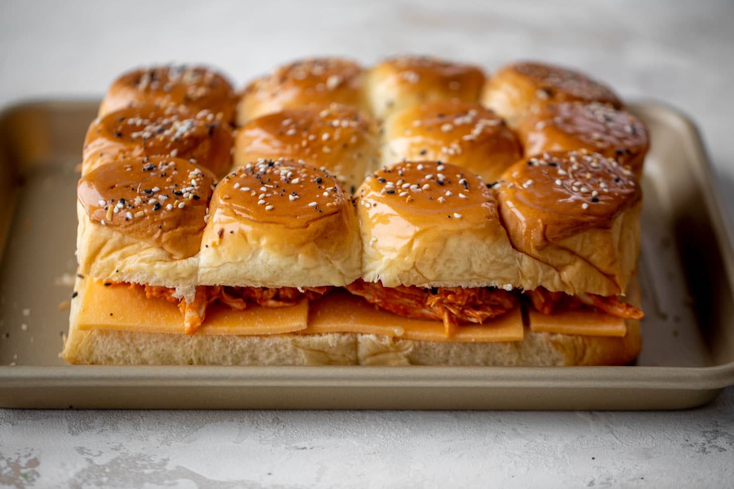 pull-apart buffalo chicken sliders ready for the oven