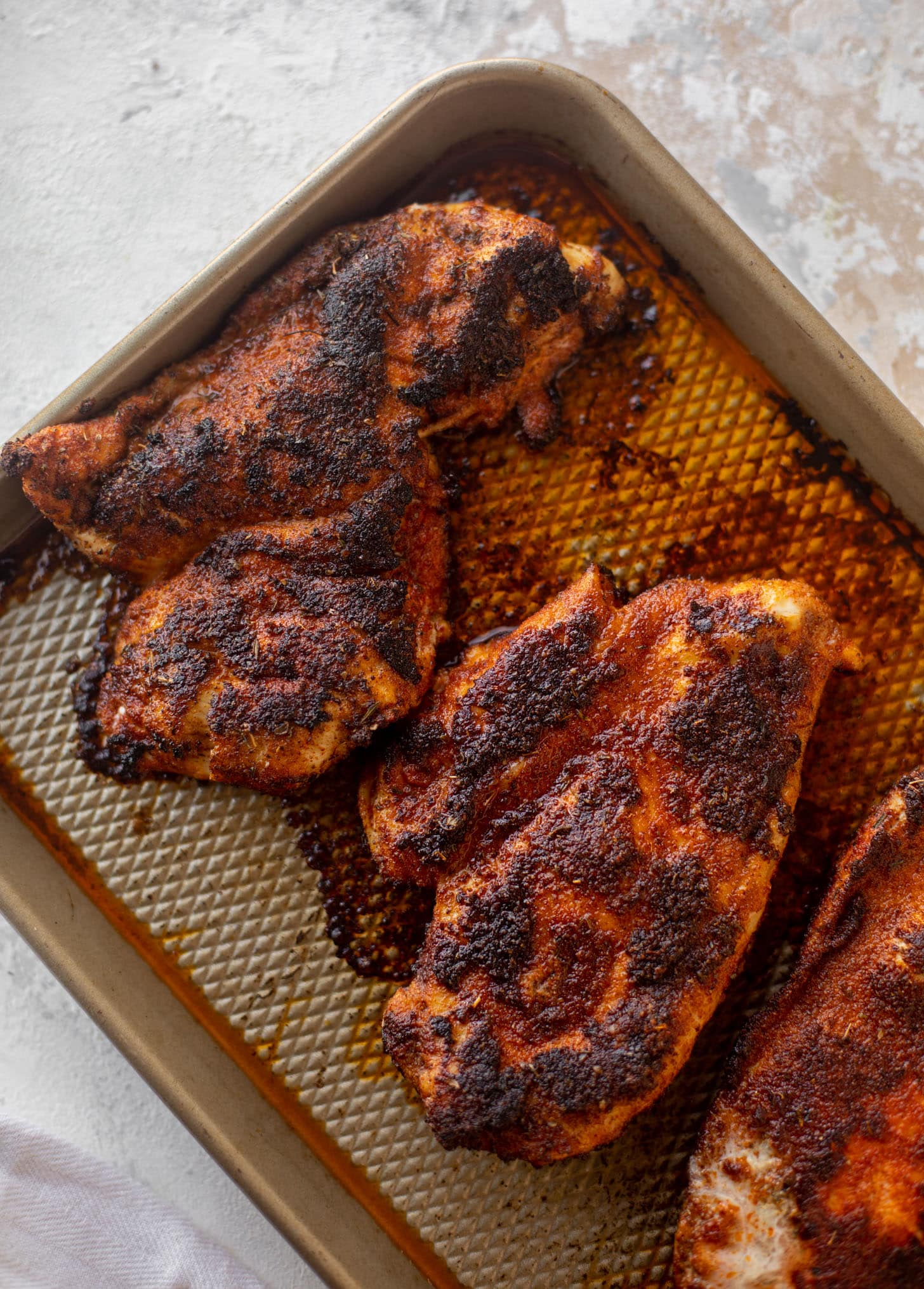 blackened chicken on a sheet pan