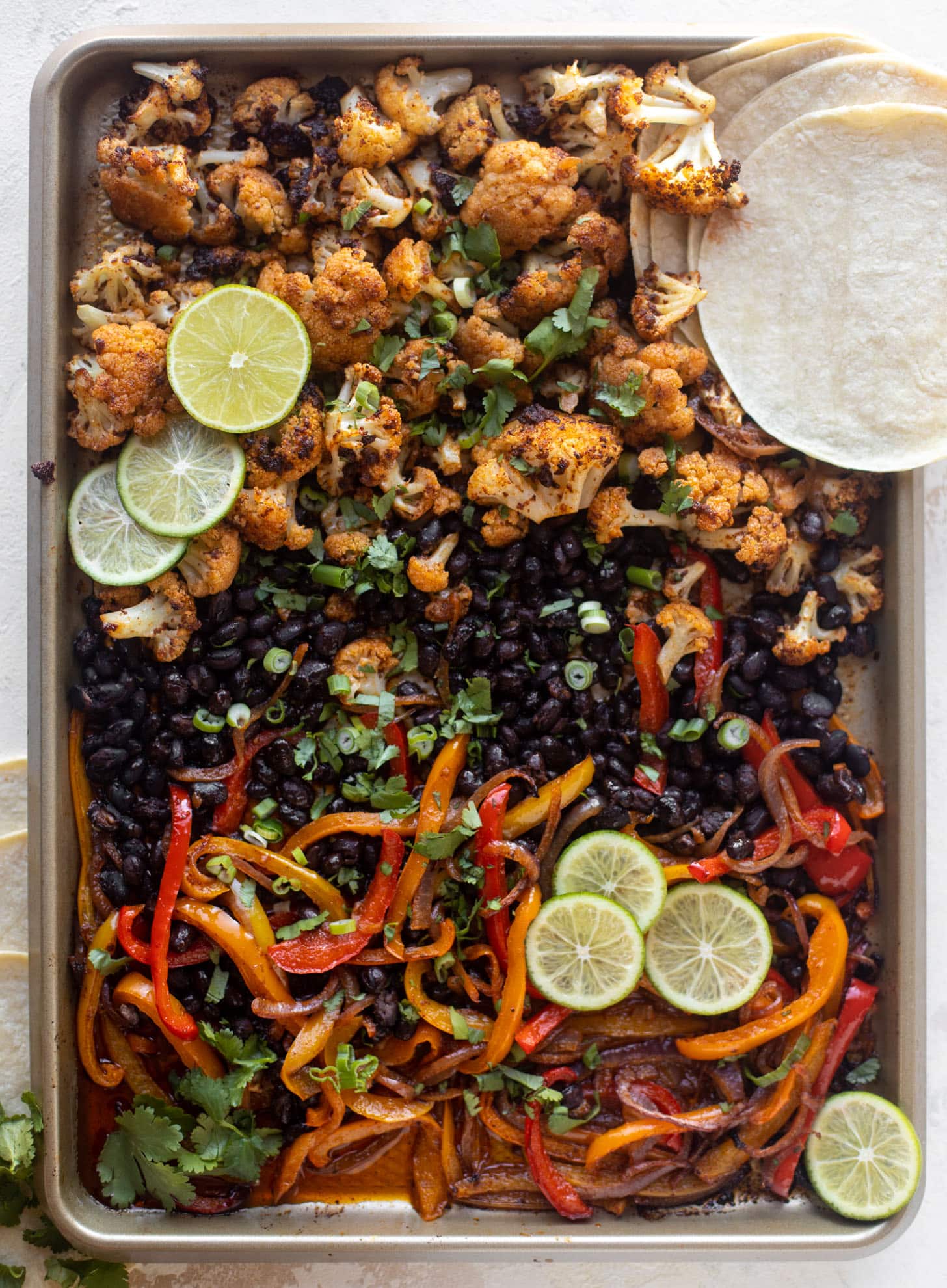 cauliflower and black bean sheet pan fajitas