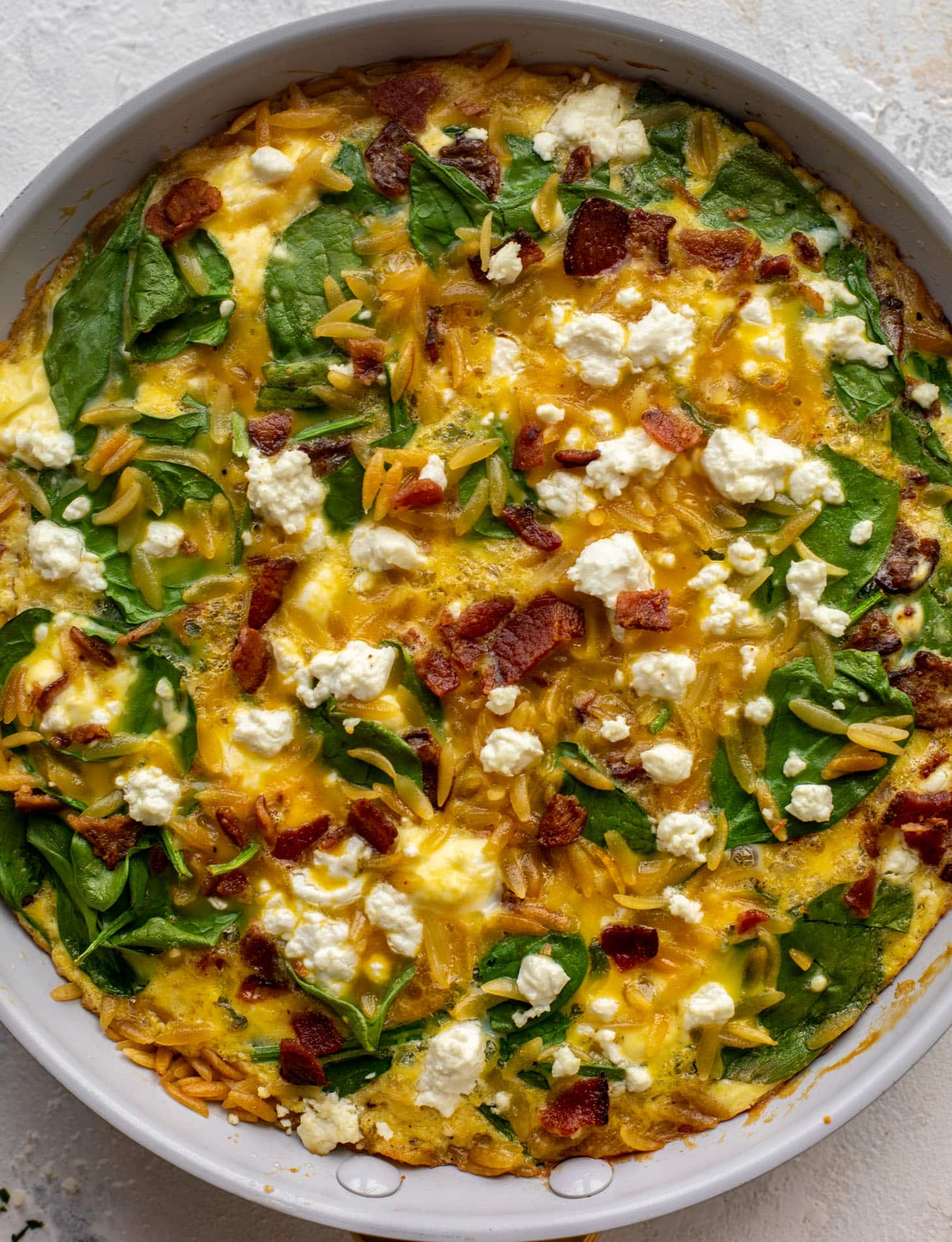crispy orzo frittata with bacon and goat cheese