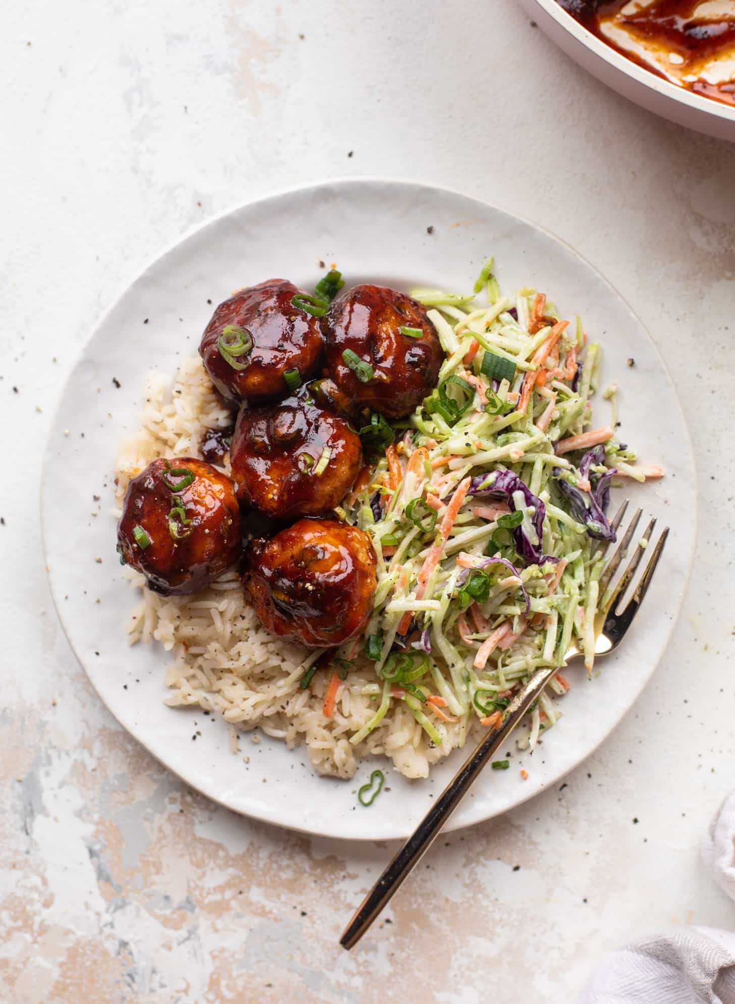 sticky BBQ chicken meatballs with broccoli slaw