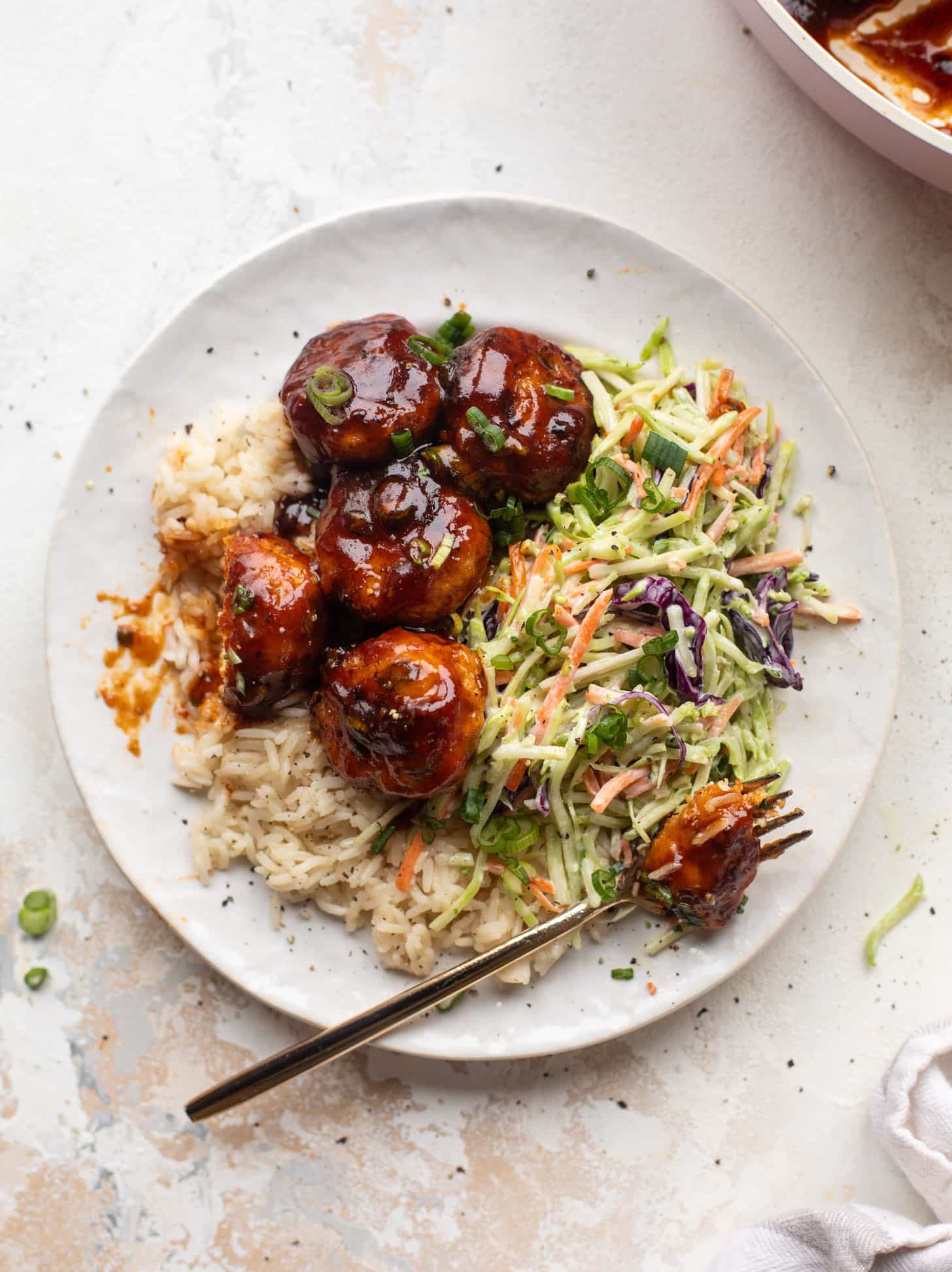sticky BBQ chicken meatballs with broccoli slaw