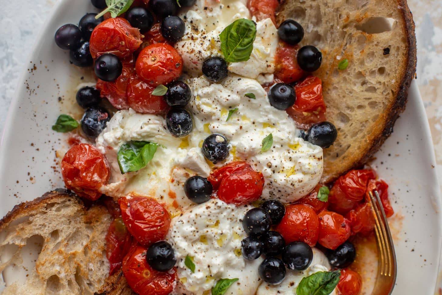red white and pickled blueberry burrata platter