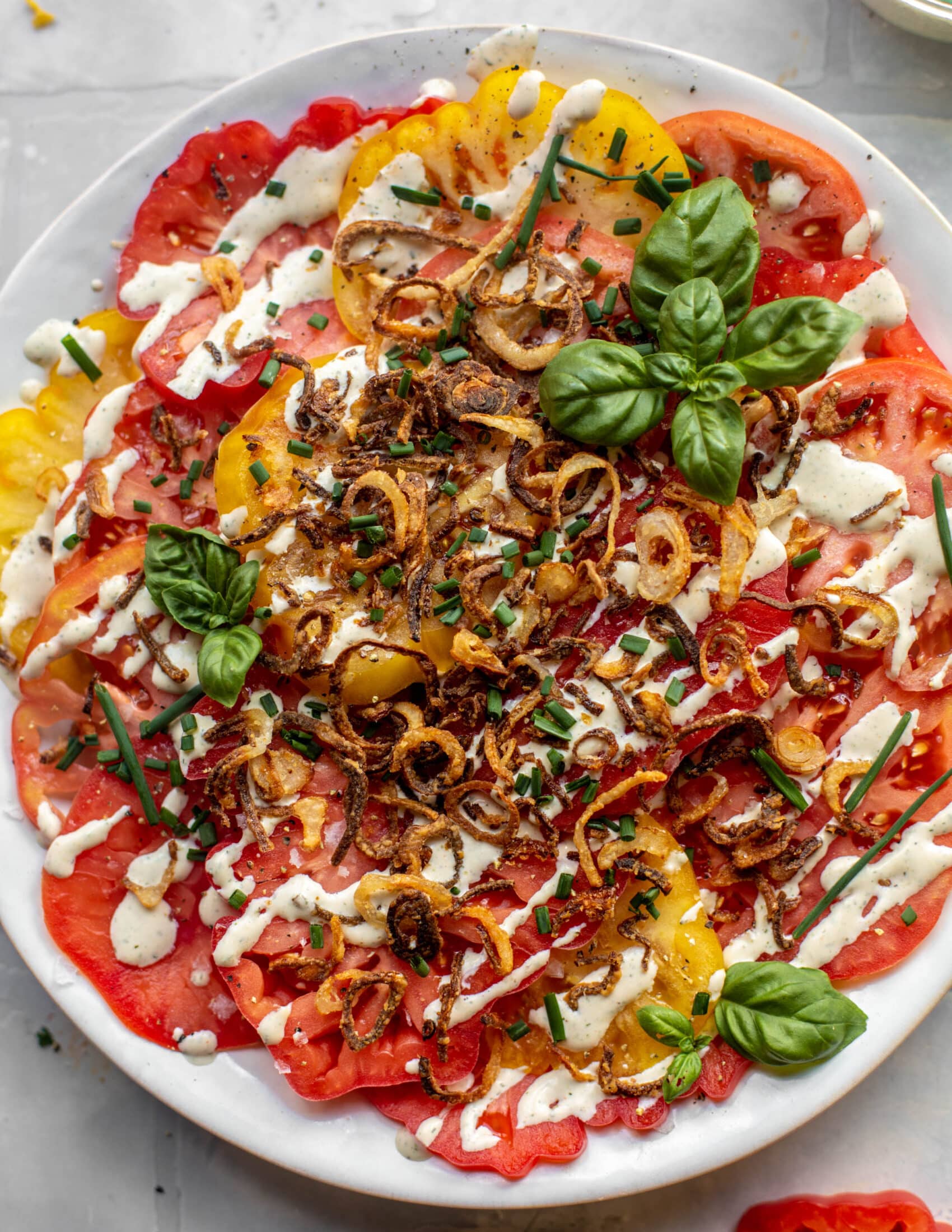 heirloom tomato salad with buttermilk ranch and crispy shallots