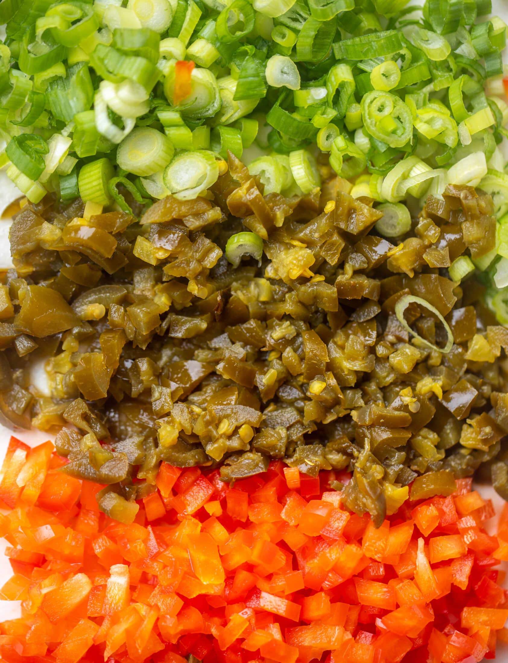 scallions, jalapeños and red peppers