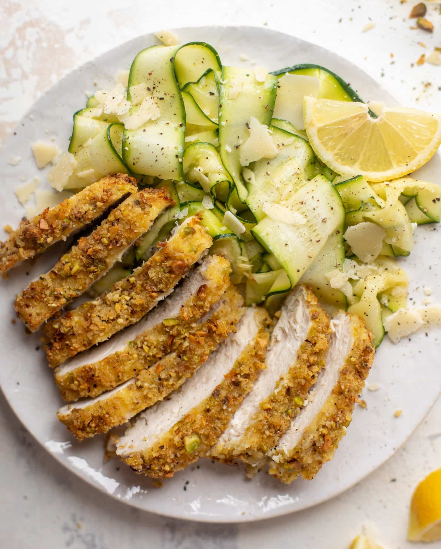 pistachio crusted chicken with zucchini ribbon salad