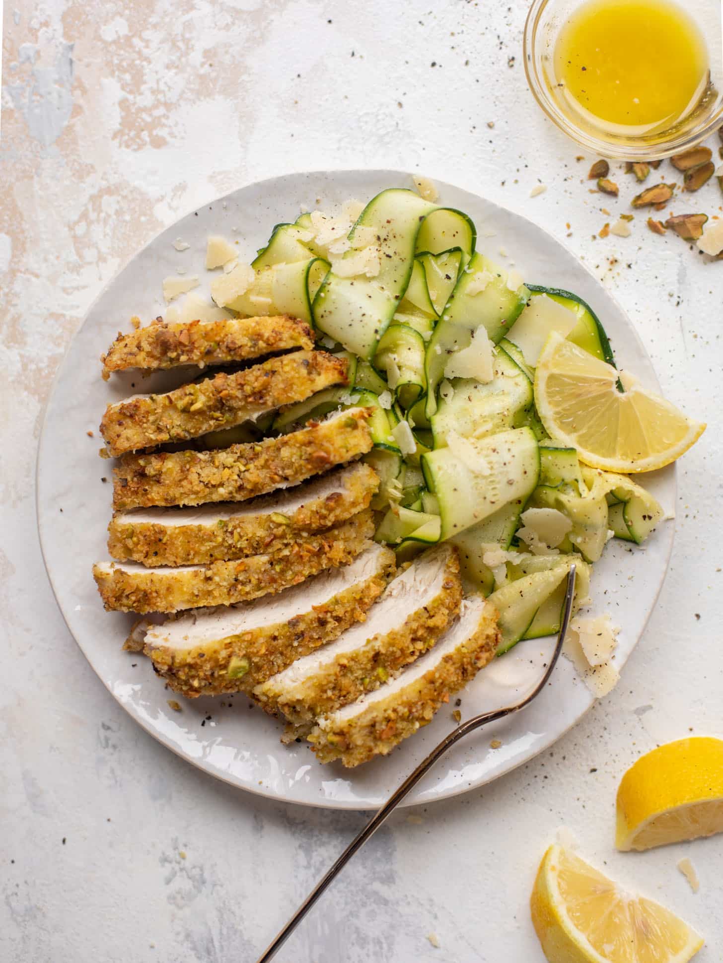 pistachio crusted chicken with zucchini ribbon salad