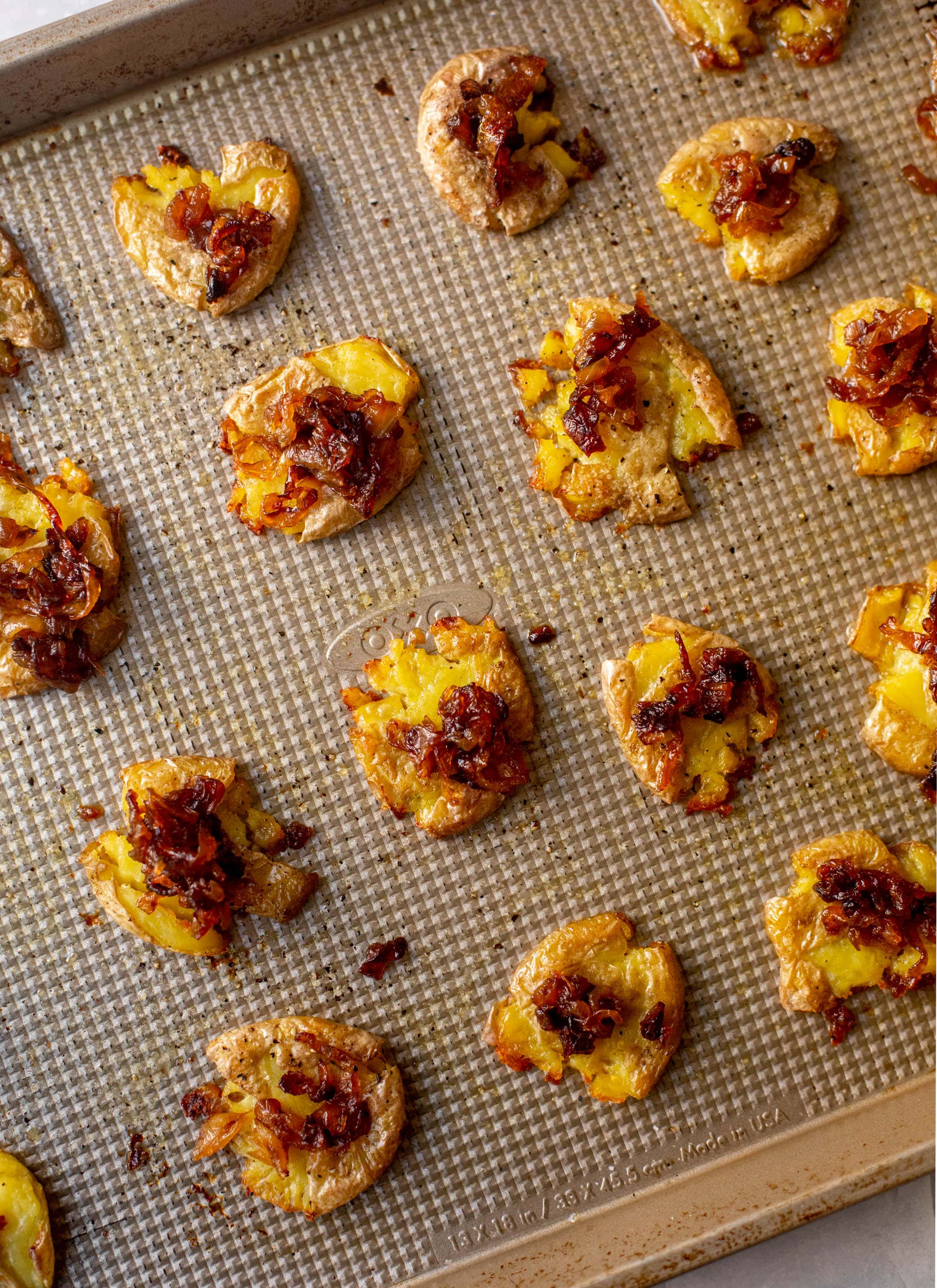 smashed potatoes on a sheet pan
