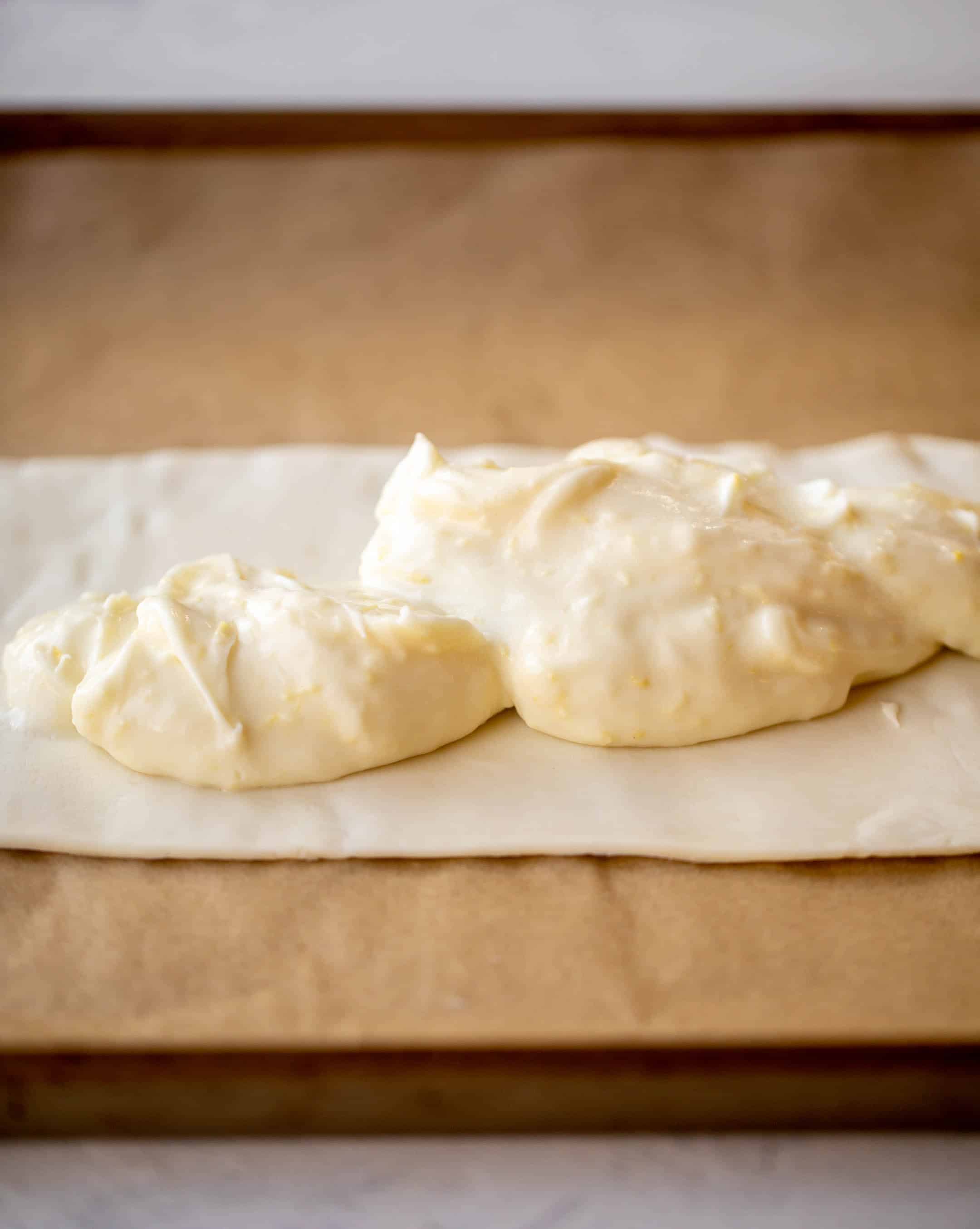 making a lemon blueberry cheese danish