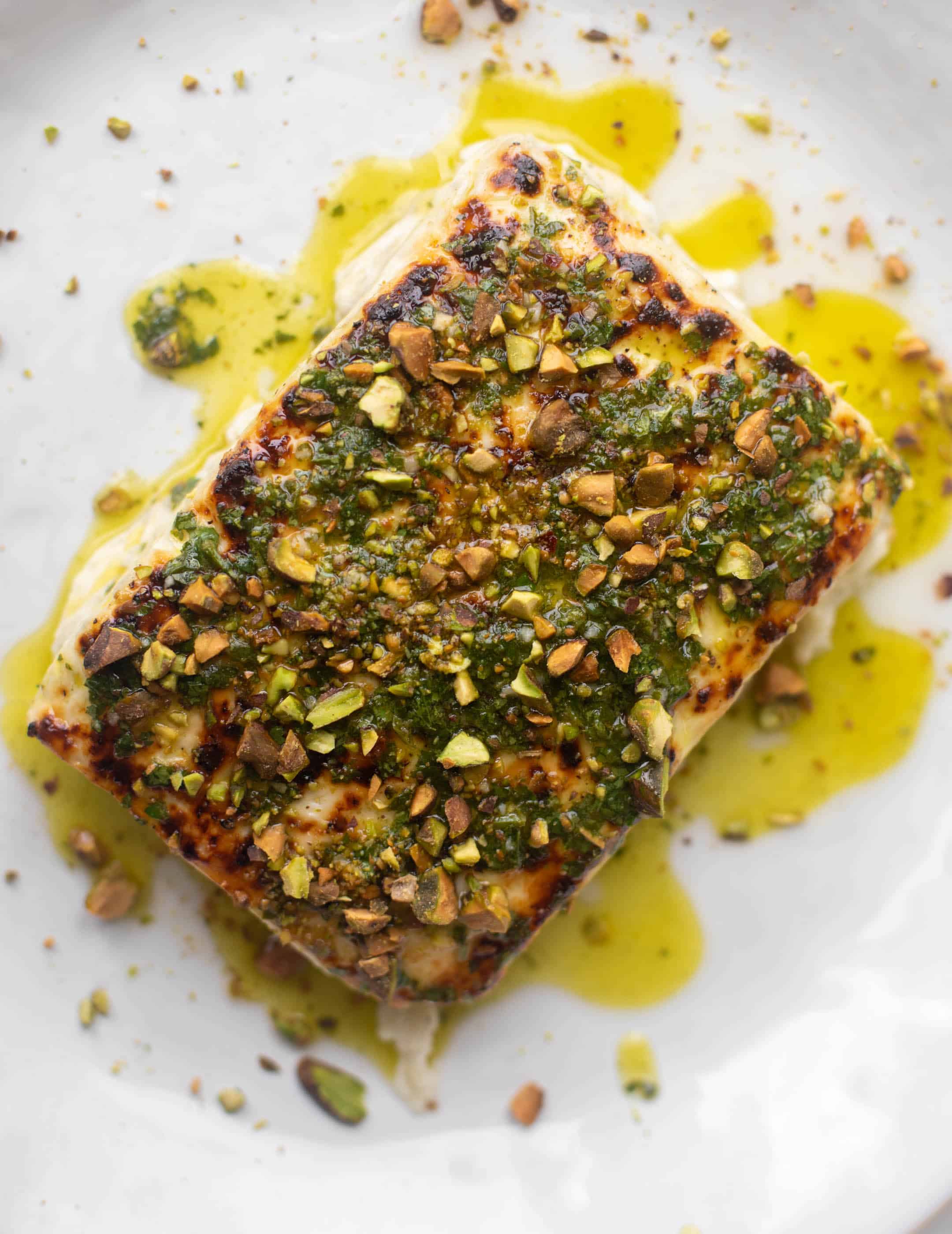 grilled feta with pistachios and chimichurri