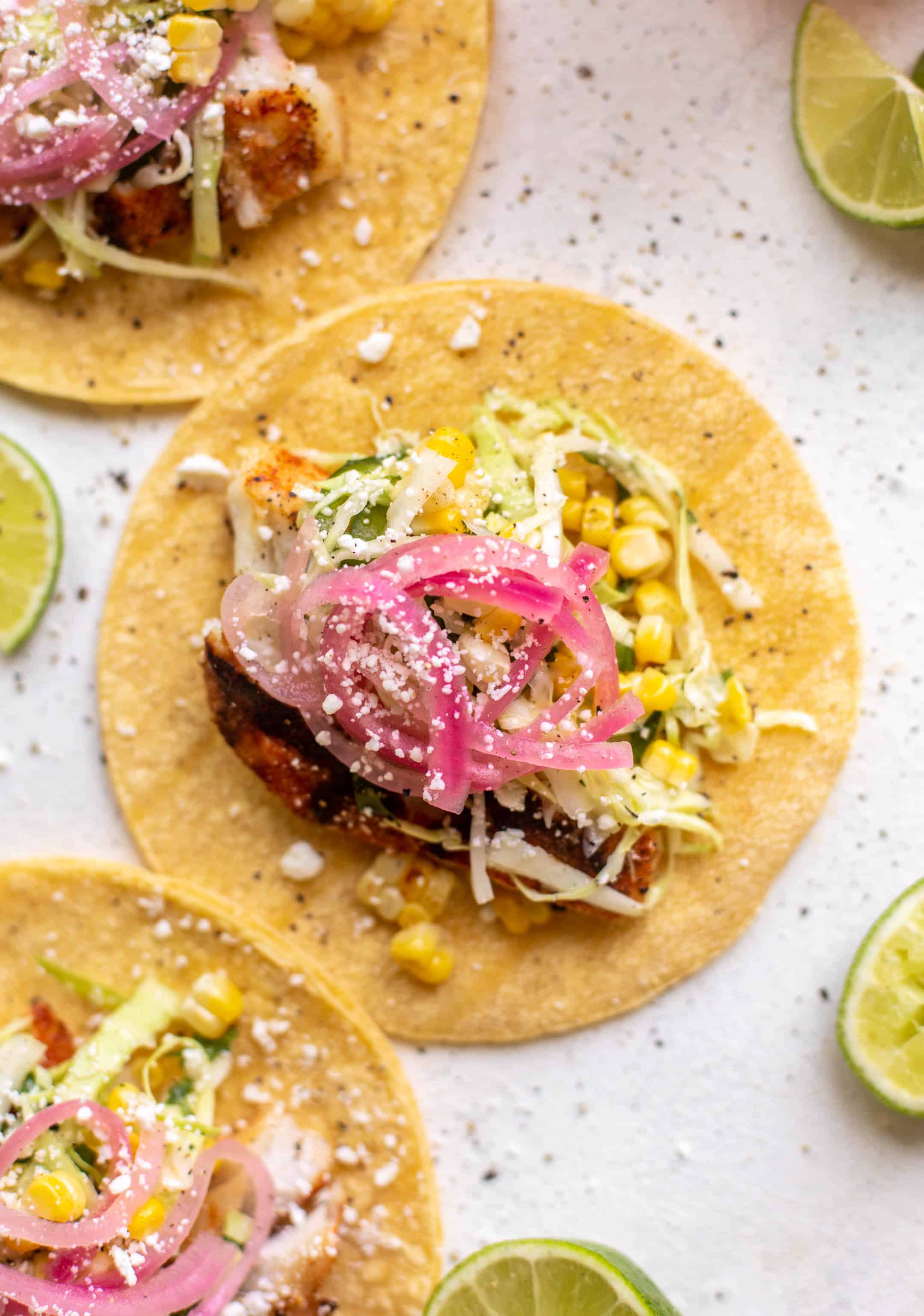 grilled fish tacos with jalapeño corn slaw
