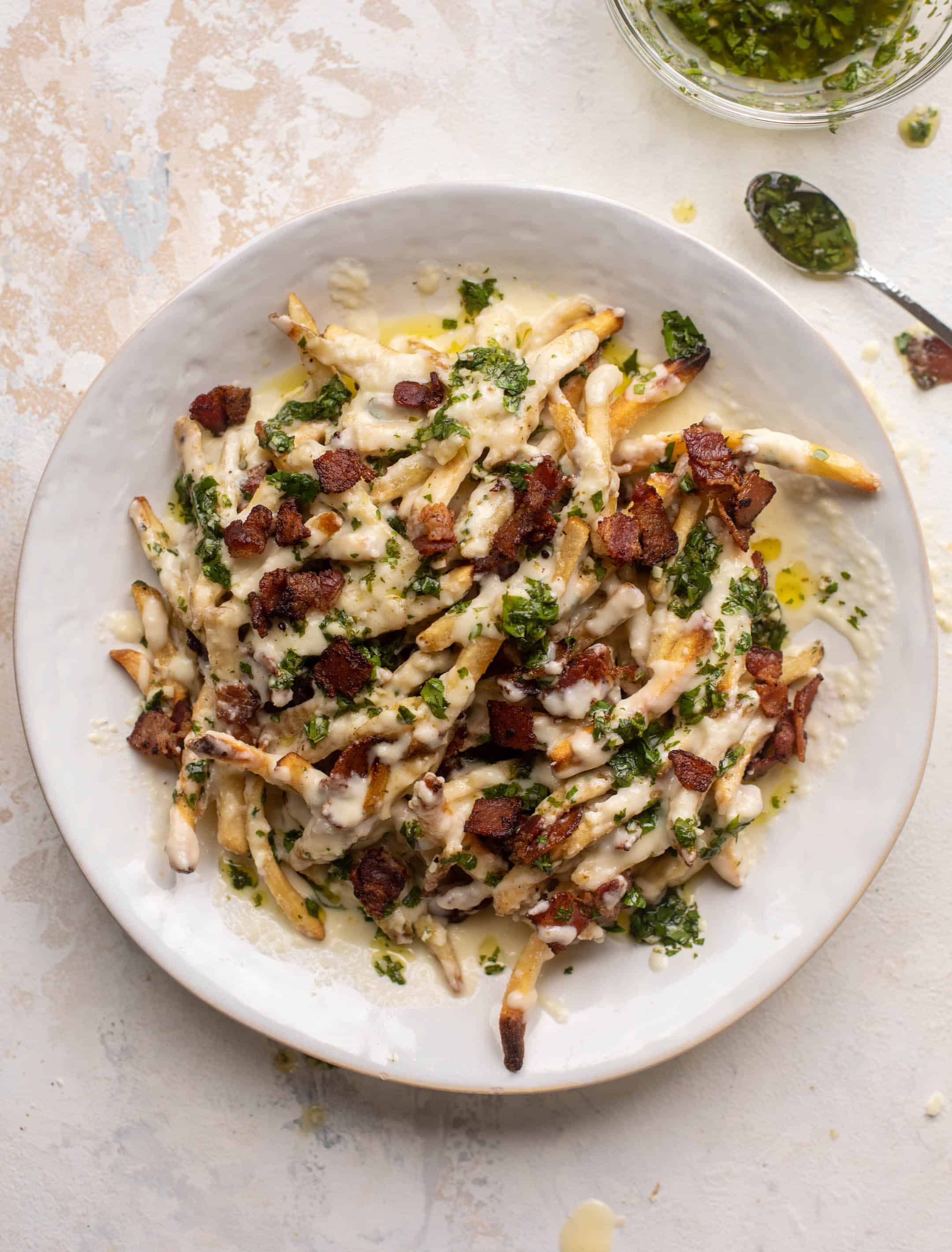 chimichurri cheese fries with chipotle bacon