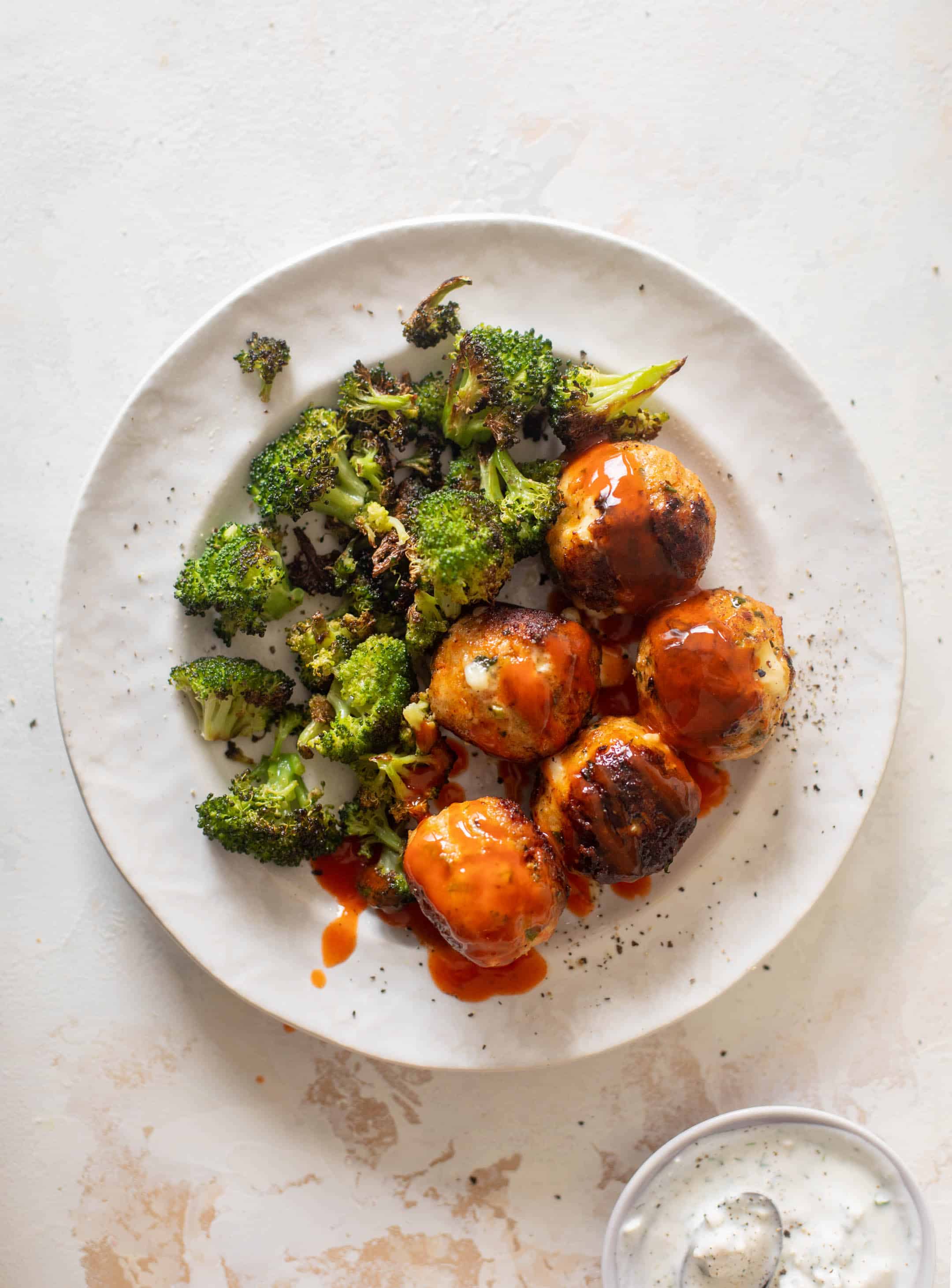 sheet pan buffalo chicken meatballs & broccoli