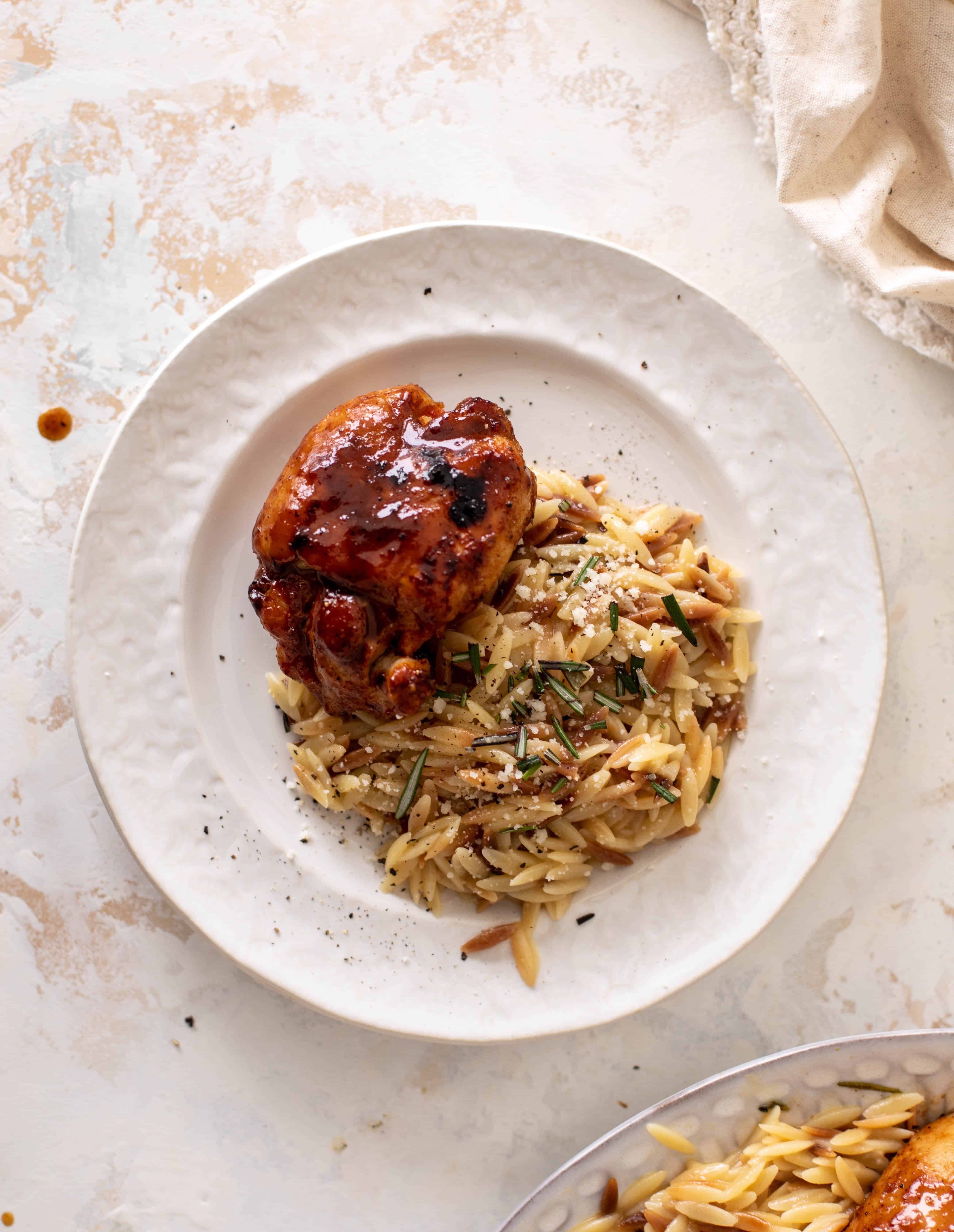 hot honey chicken thighs with rosemary orzo