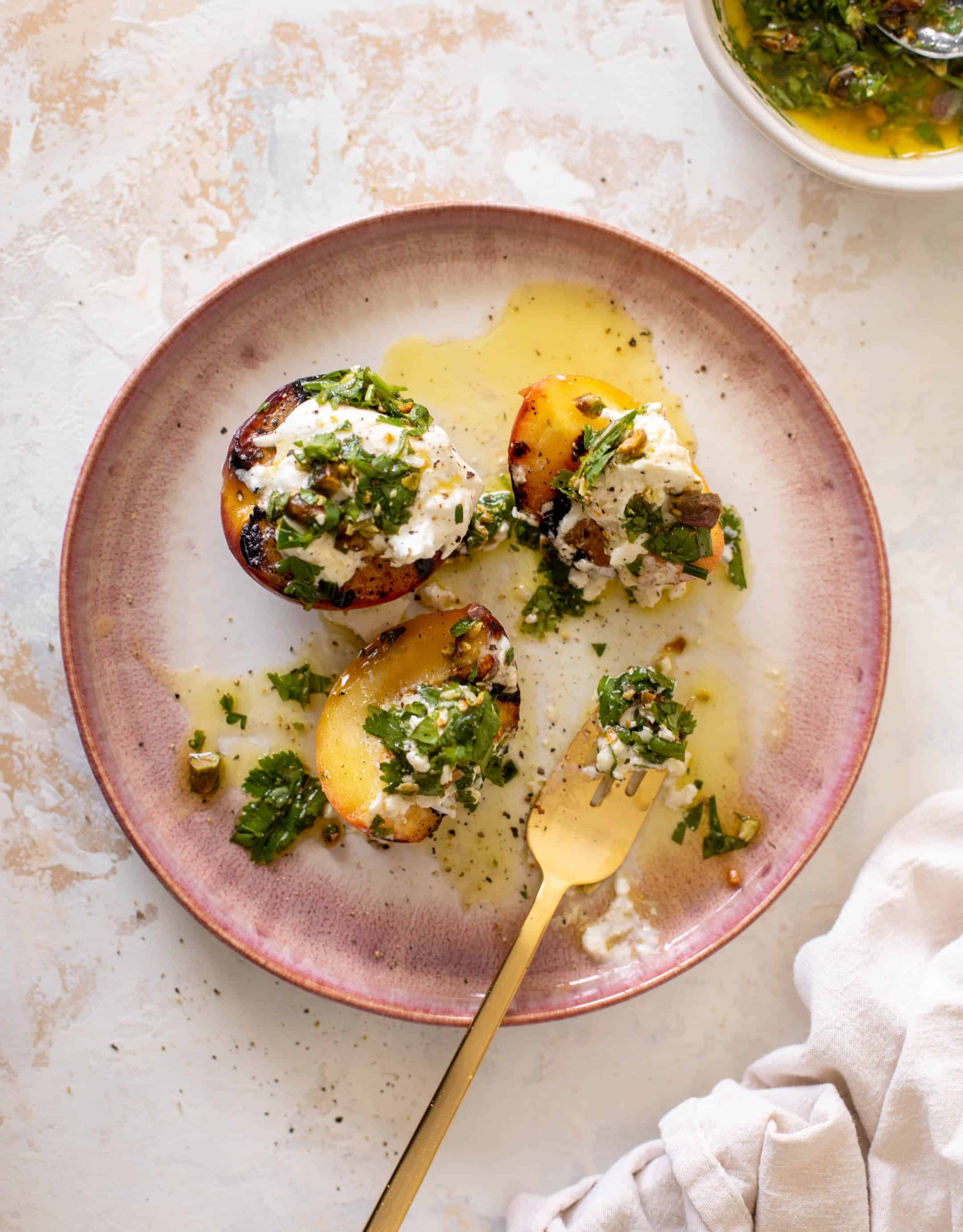 grilled peaches with burrata and pistachio vinaigrette