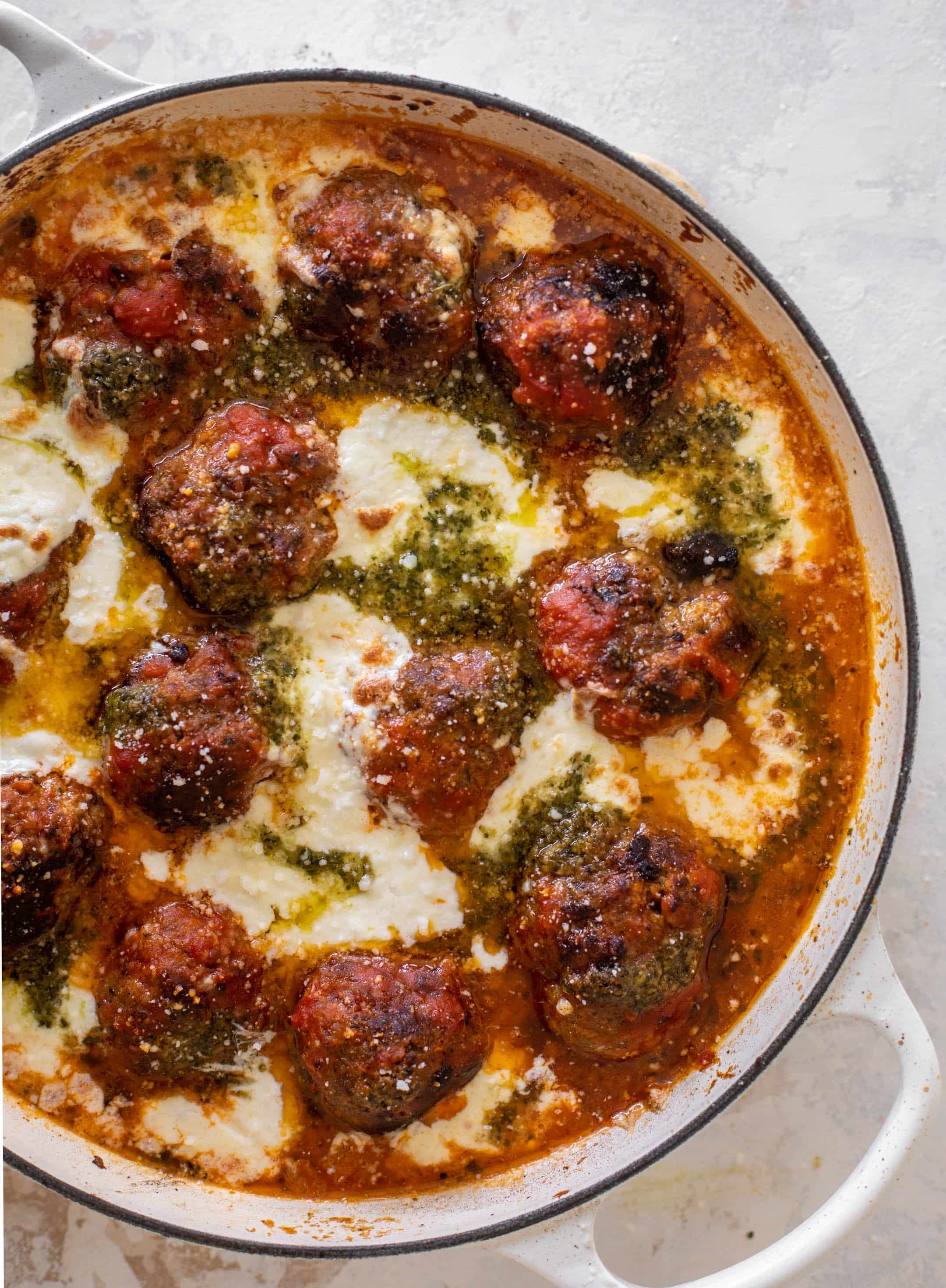 cheesy baked pesto meatballs with burrata