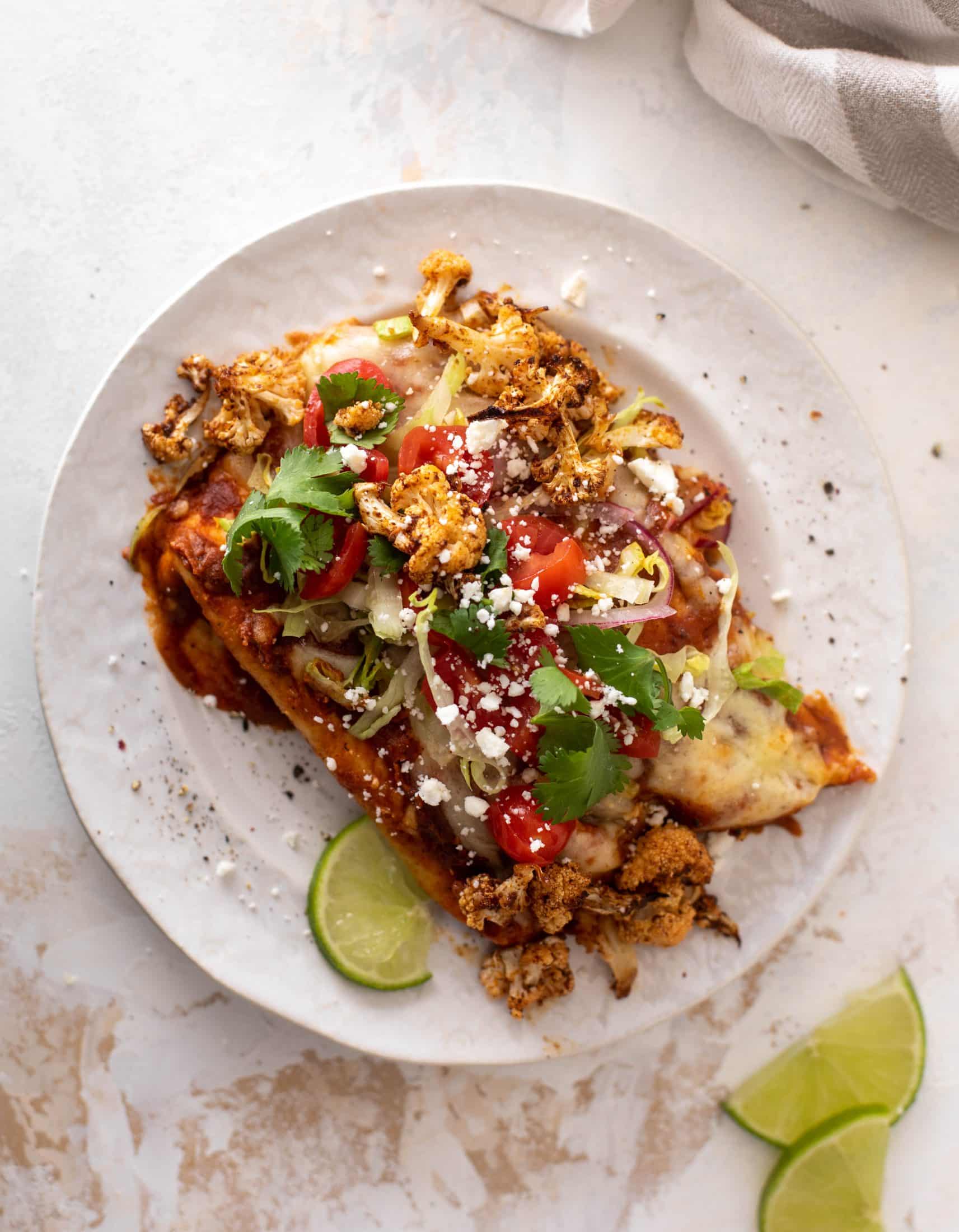 chipotle cheddar cauliflower enchiladas