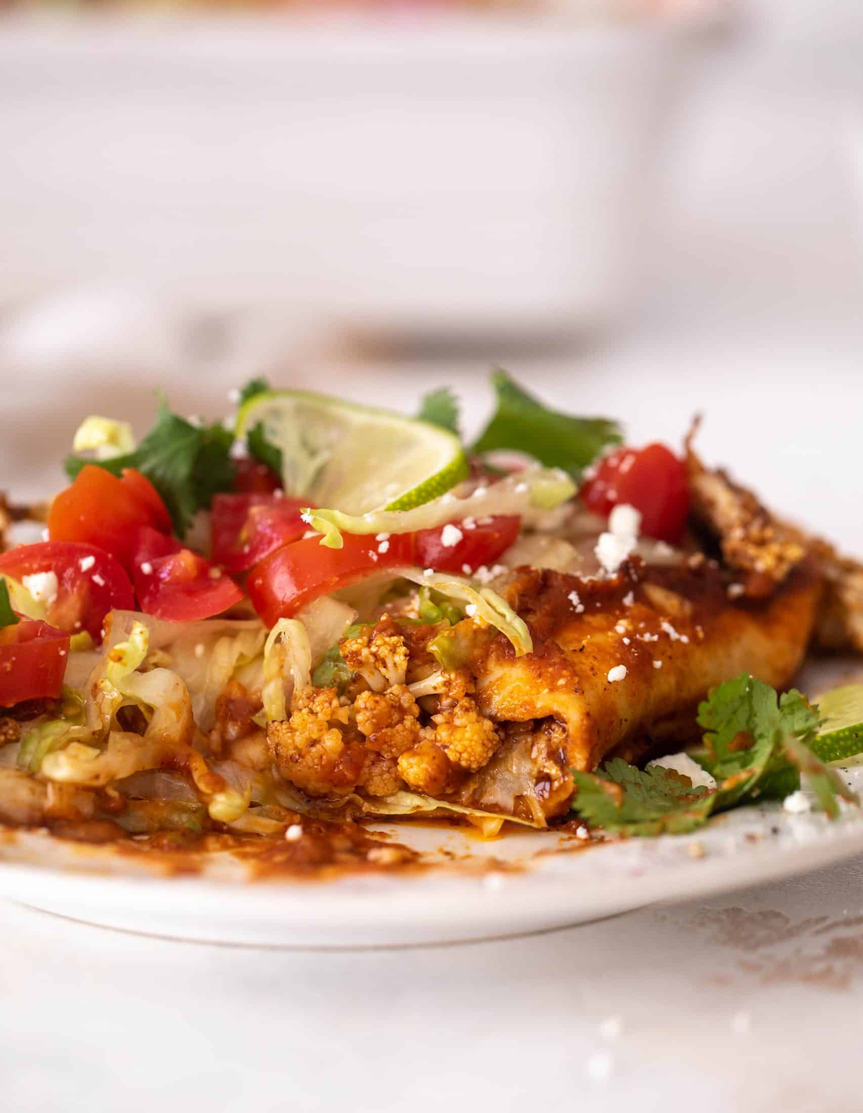 chipotle cheddar cauliflower enchiladas