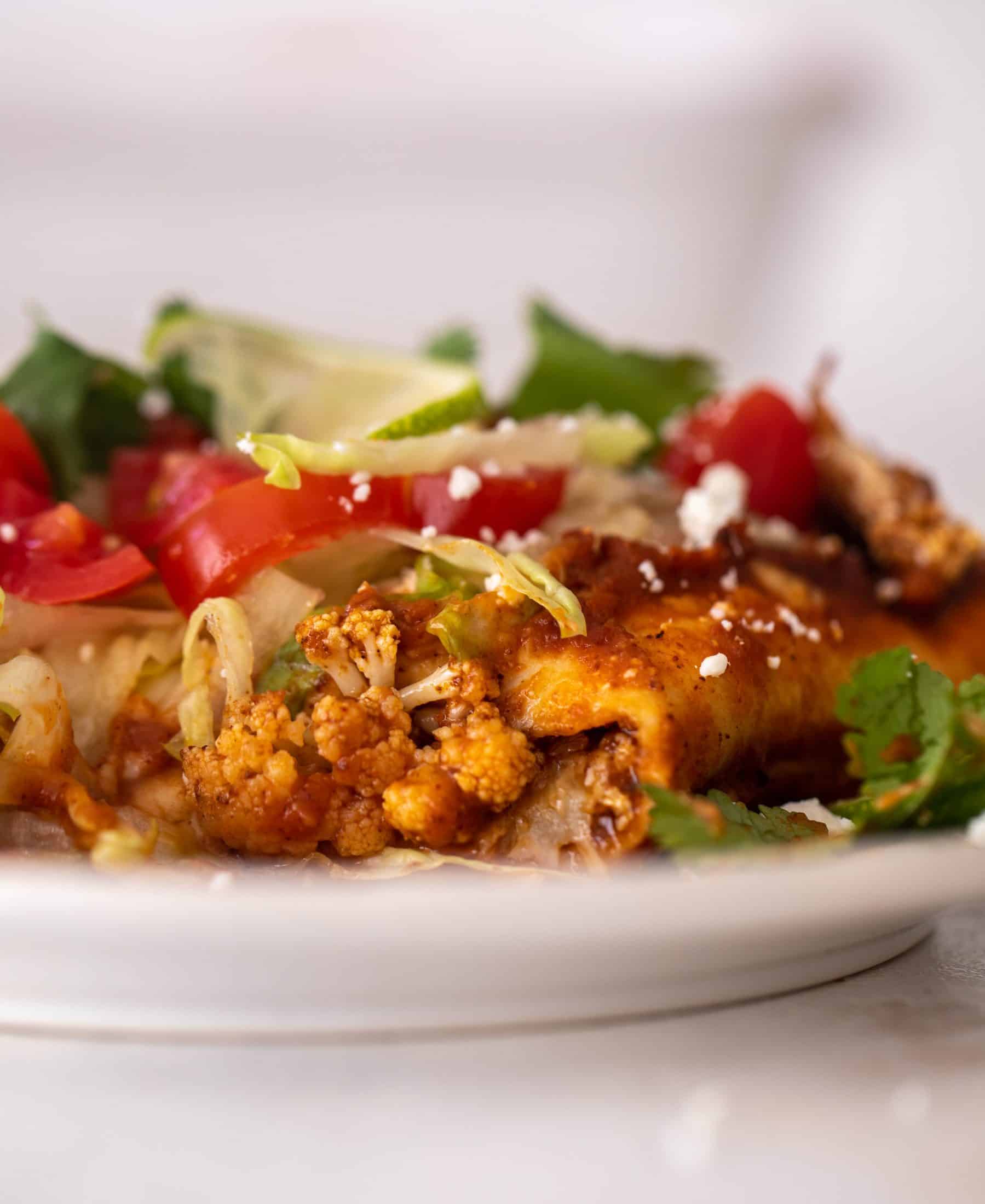 chipotle cheddar cauliflower enchiladas