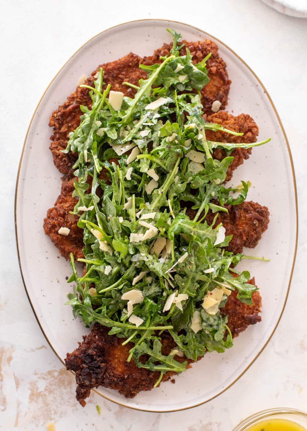 pretzel crusted chicken with honey mustard arugula