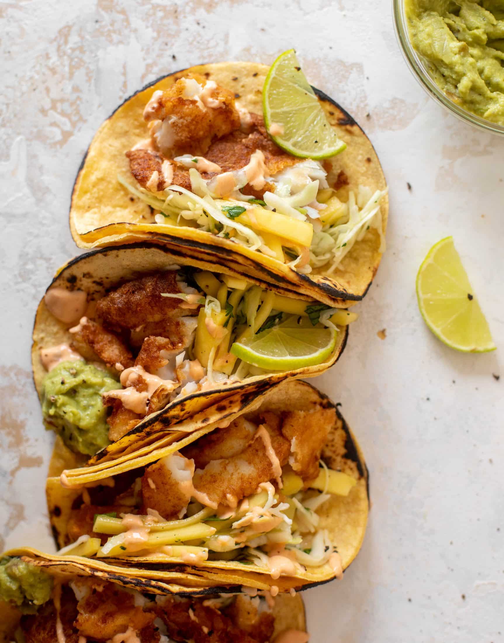 crispy fish tacos with mango slaw