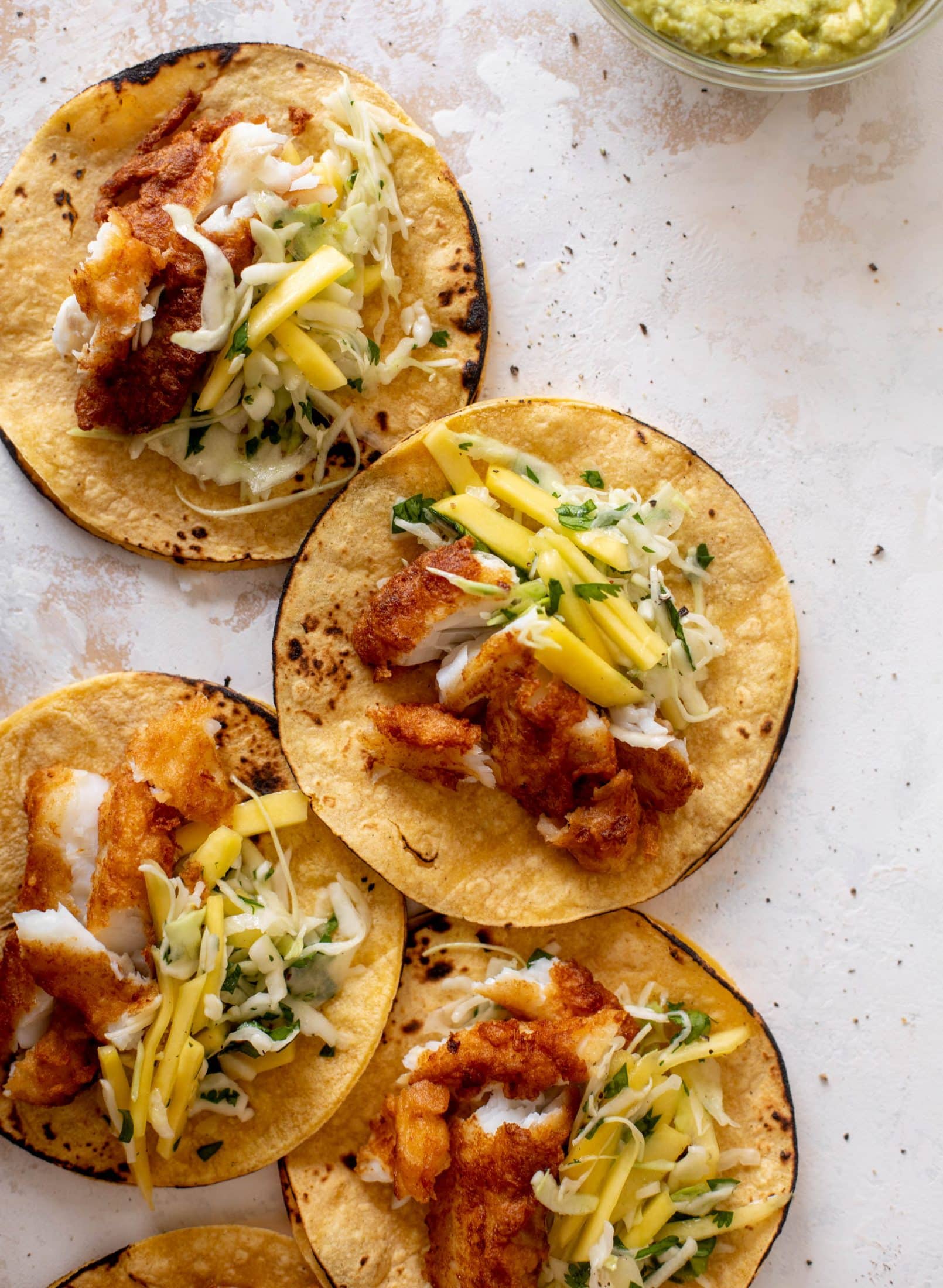 crispy fish tacos with mango slaw