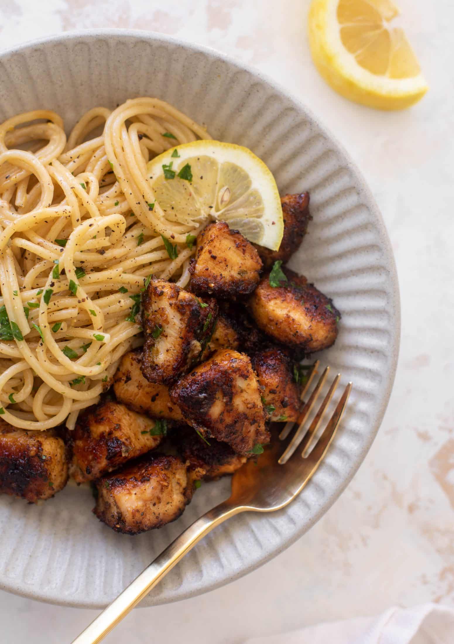 crispy lemon chicken bites and spaghetti