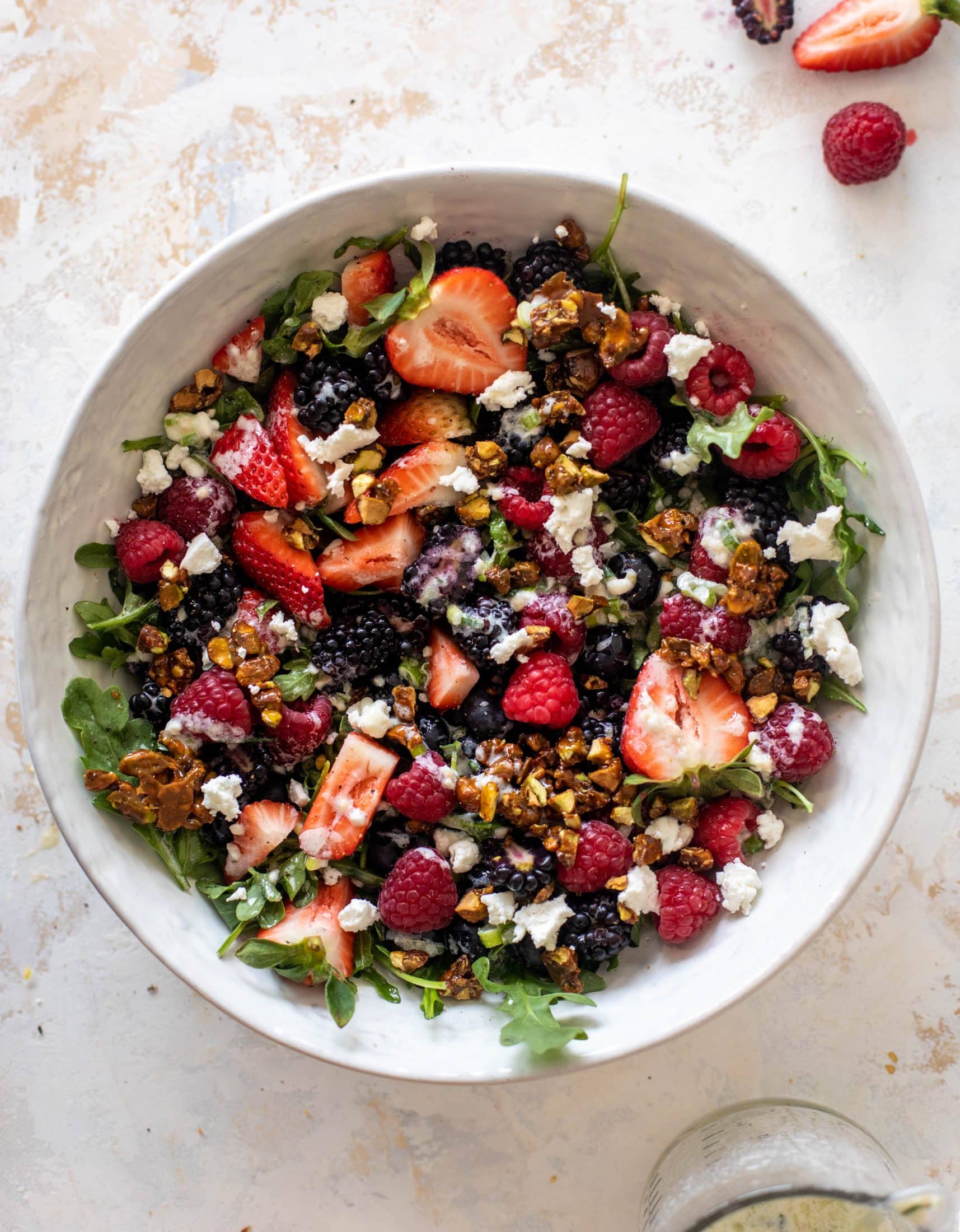 red white and berry arugula salad