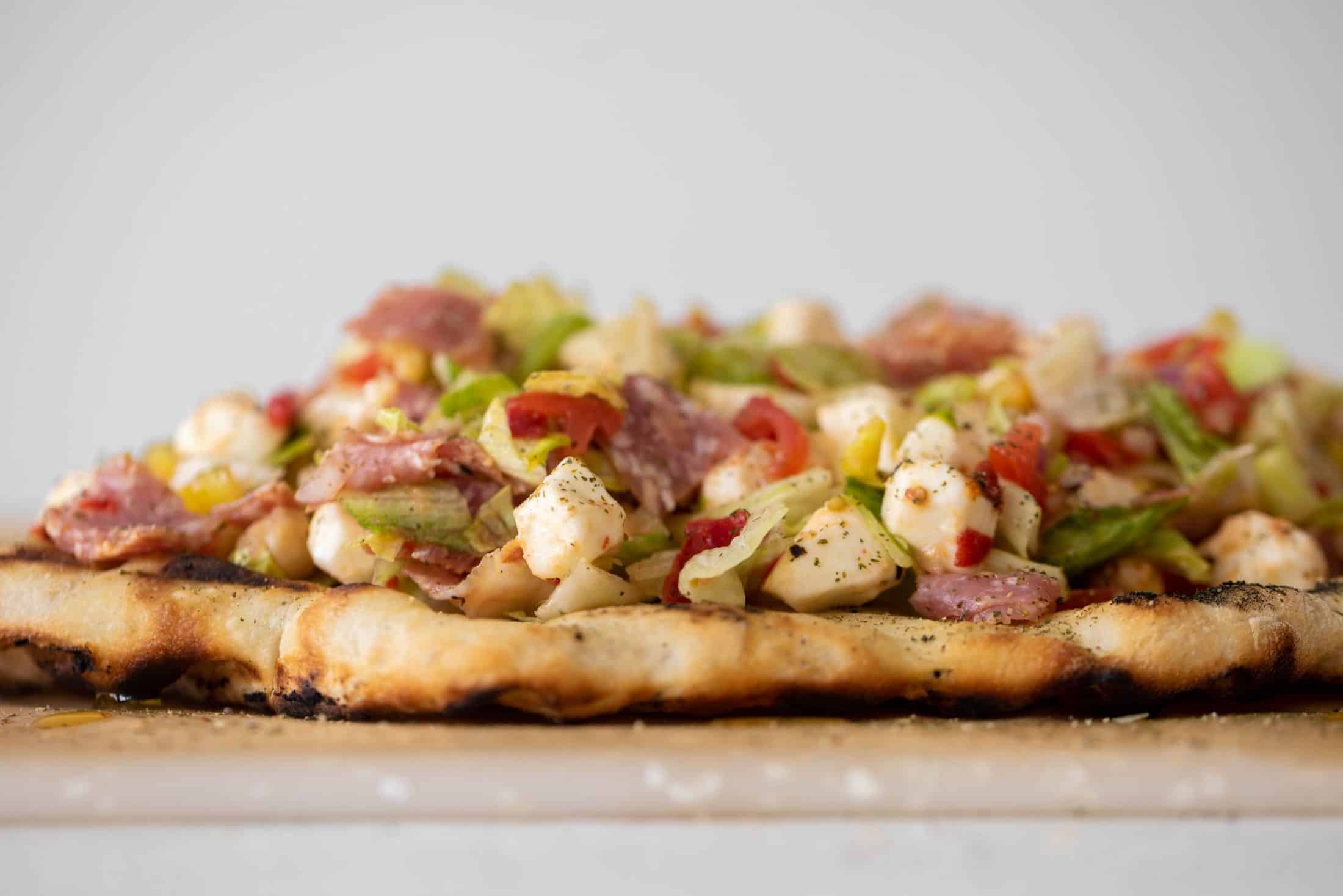 sourdough pizza with italian chopped salad