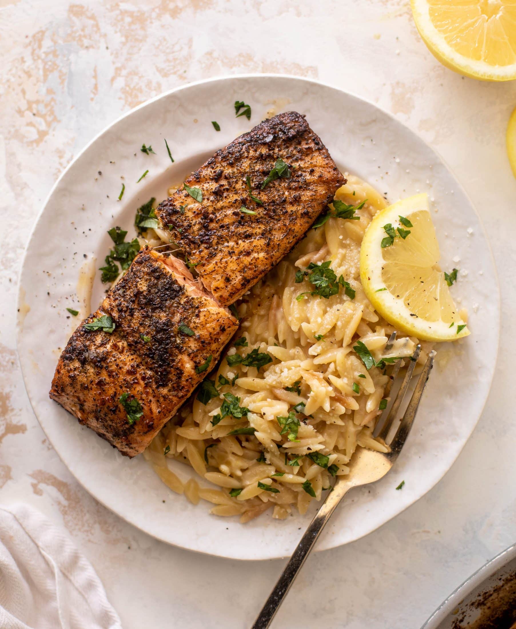 salmon aglio olio with lemon parm orzo