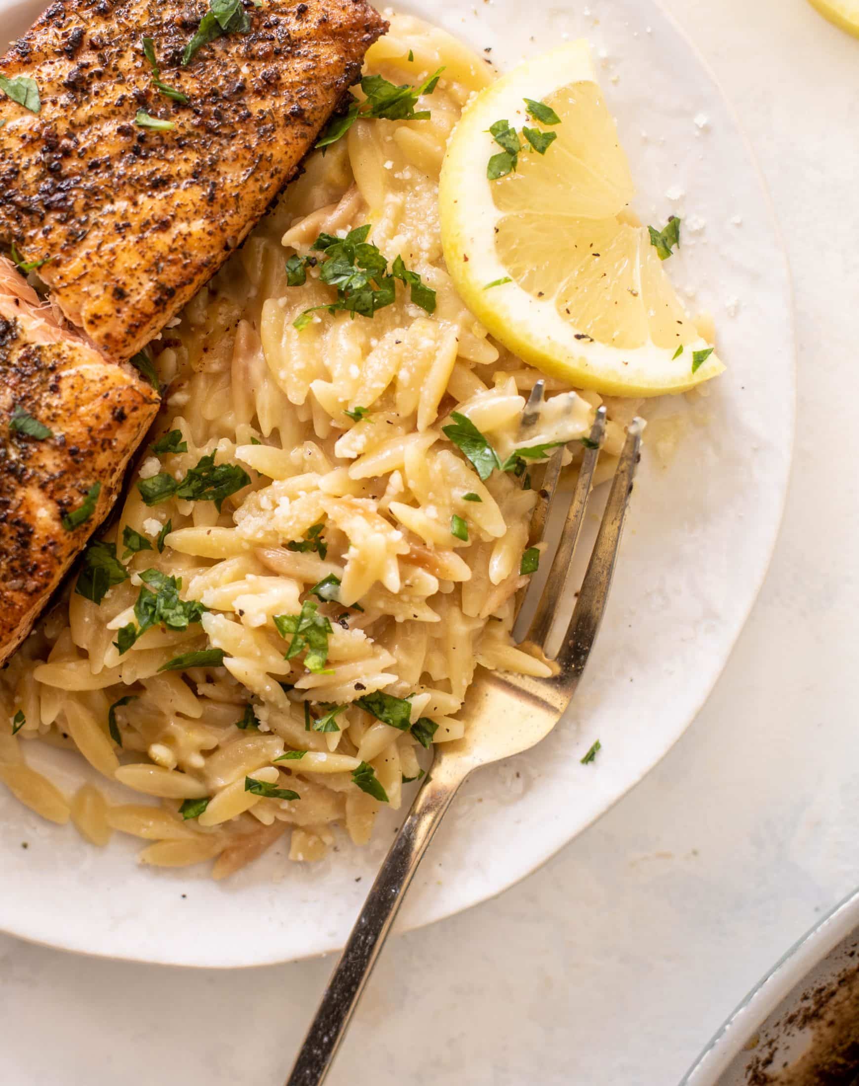 salmon aglio olio with lemon parm orzo
