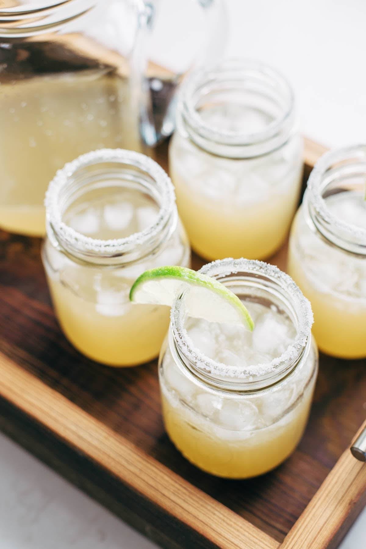 Pitcher Margaritas for a Crowd - all you need is simple syrup, lime juice, and tequila. These make THE BEST party drinks! | pinchofyum.com