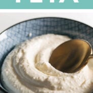 Whipped feta in a bowl with a spoon.